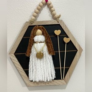 Handmade macrame doll wall decor
